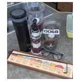 Candles, water bottle, and wall decor