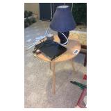 Peg board top table, DVD player and lamp