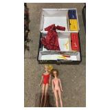 Barbie dolls and case