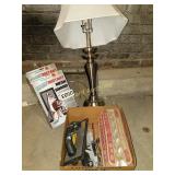 Lamp, mesh guard, golf balls, more