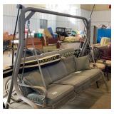 Outdoor swing and umbrella