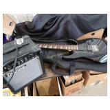 Ibanez electric guitar, gig bag & practice amp