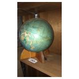 Globe on wooden stand