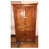 Spoon carved cabinet