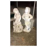 Boy and girl statues (plastic)
