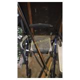 Brooms, walking cane, rolling walker