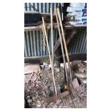 Rakes, broom pitchfork and shovel