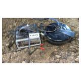 Battery charger and extension cord reel