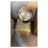 Globe and storage ottoman