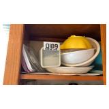 Casserole dishes, bowls, and Tupperware