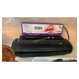 Vacuum sealer and sealer rolls