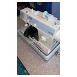 Portable Singer sewing machine and case