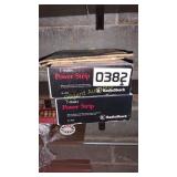 1945 newspaper and (2) power strips