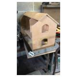 Partially built wooden doll house
