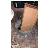Galvanized tub, calendar hanger and tarps