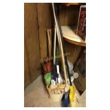 Milk can w/Yardsticks, metal watering can, brooms