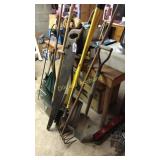 Rakes, shepherds hook, large saw, shovel, & more