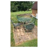 Iron patio table with four chairs