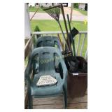 Four green plastic chairs, yard sign, yard tools