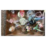 Humming bird, bells and glass figurines