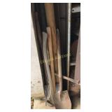 Shovels, axe, wood post, angle iron, more
