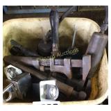 Oil cans, wrenches, and truck parts