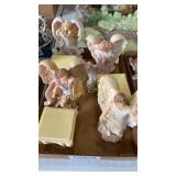 Roman Inc. figurines and display base