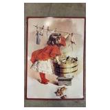 Little girl doing laundry art metal sign