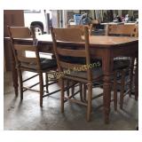 Dining room table with four chairs