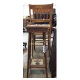 Wooden stool with decorative tiles