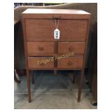 Four drawer wooden stand