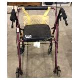 Walker with seat and bag