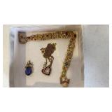 10K bracelet, pendant, and 10K ruby heart