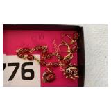 14 K ladybug bracelet, earrings, pendant, & pin
