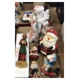 Santa figurines, ornaments and candle