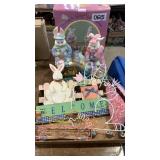 Preparing for spring rabbit figurines and other