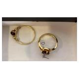 2 rings - one with two small diamonds