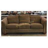 Light brown colored couch