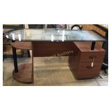 Glass top partial board desk. Two drawers one