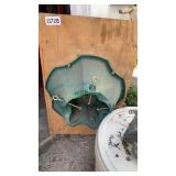 Tree base, step ladder, bucket of birdseed