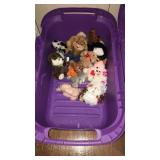 Purple tote with misc stuffed animals