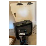 Axe shavers, old TV and marker board