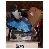 Crate of exercise tapes and equipment