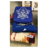 Stadium seats and throw blankets