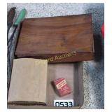 Carpet nails, wooden box and egg carton