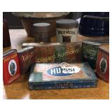 Coffee cans and tobacco tins