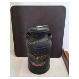 Milk can and card table