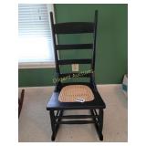 Caned bottom wooden rocker