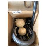 Baseballs and helmet