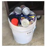 STP oil cans and bucket